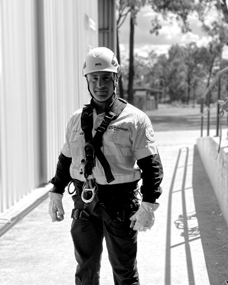 Matt Chilingirian in rescue harness and hi-vis during mine emergency response training